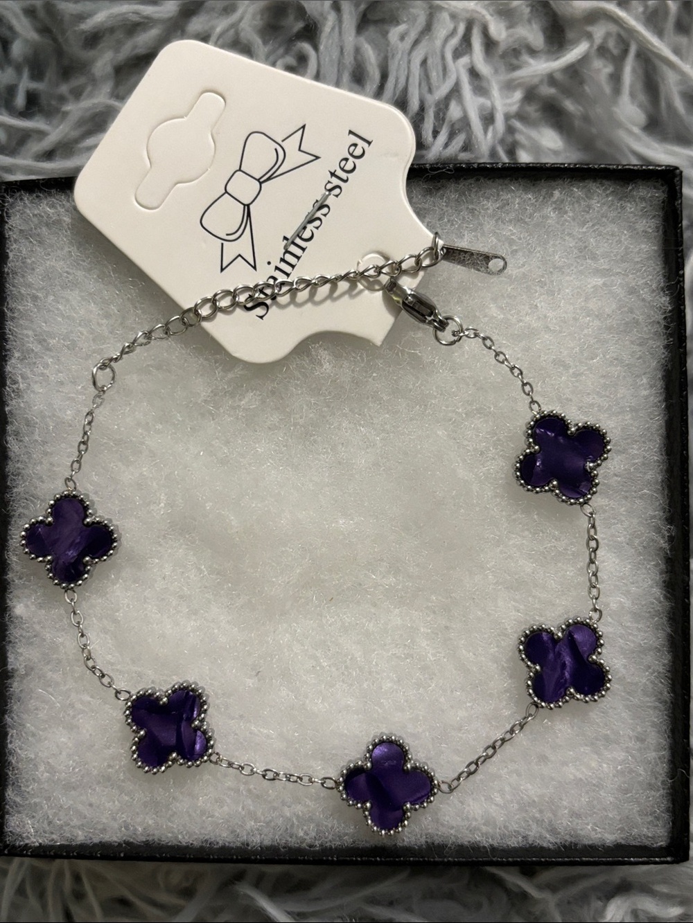 Stainless Steel Bracelet with Purple Clover Charms